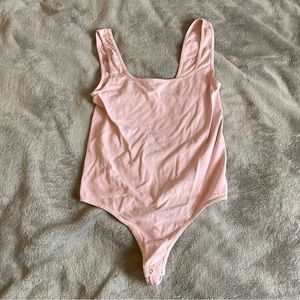 Bebe light pink bodysuit size small